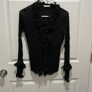 Beautiful sheer crinkly black blouse with ruffled neck and button line!